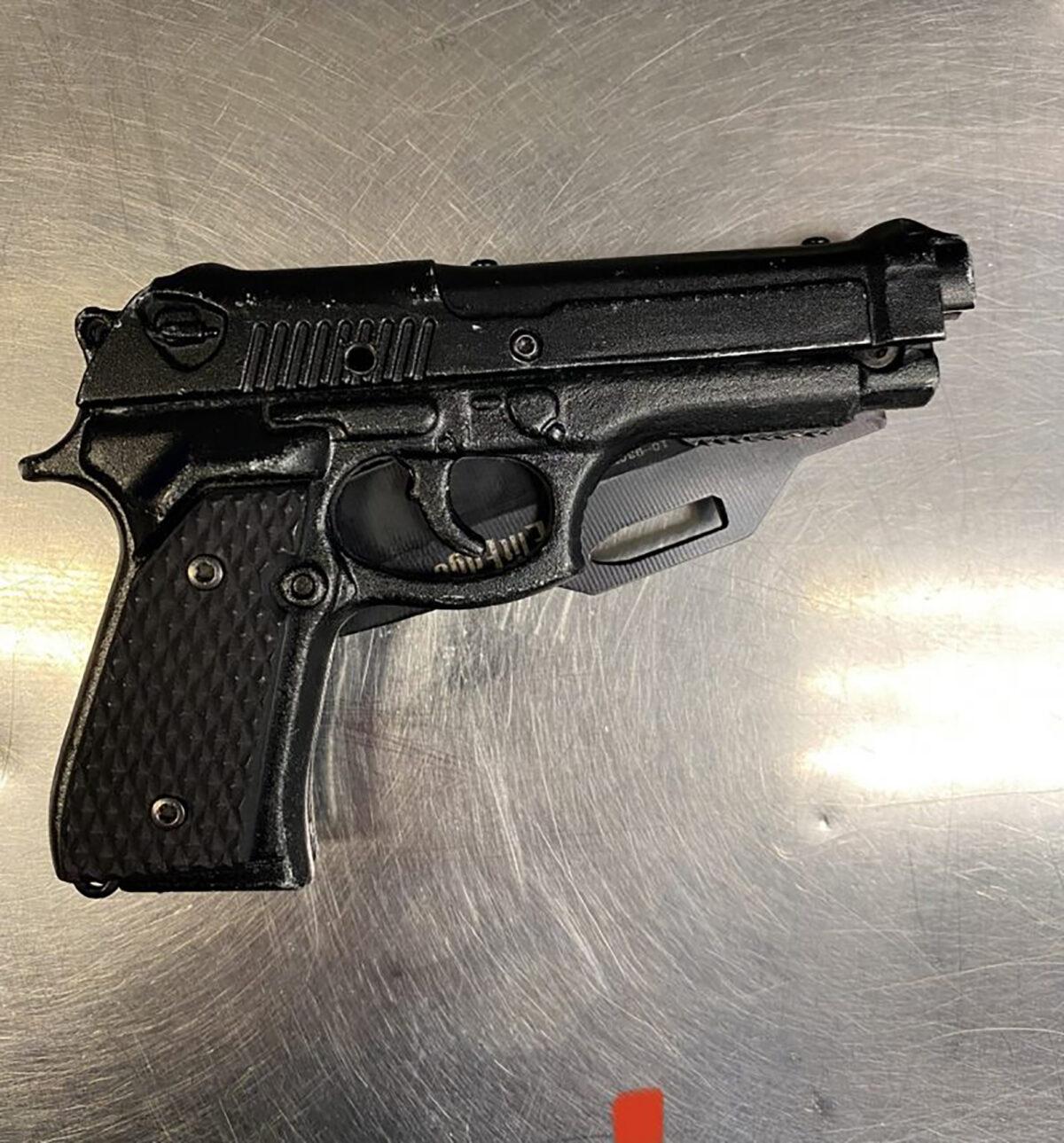 A replica gun with a knife that was taken from the man arrested in Tuesday night’s attack on Dave Chappelle at the Hollywood Bowl, Calif., on May 3, 2022. (Los Angeles Police Department)