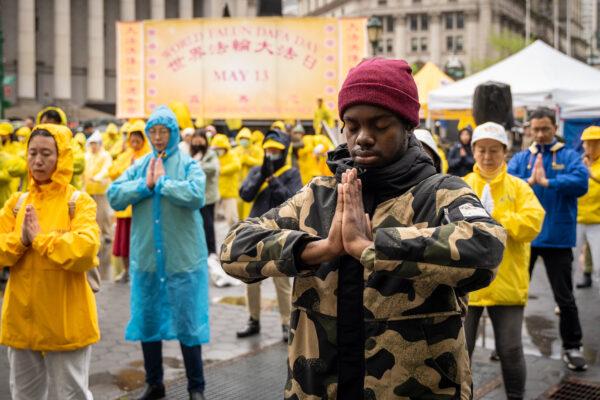 Falun Gong practitioners take part in an event to celebrate World Falun Dafa Day in Foley Square in New York City on May 7, 2022. (Samira Bouaou/The Epoch Times)