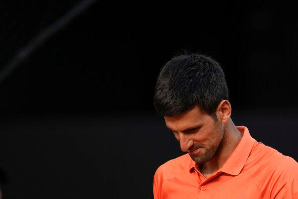 Novak Djokovic reacts during a men's semifinal match against Carlos Alcaraz at the Mutua Madrid Open tennis tournament in Madrid, Spain, May 7, 2022. (Manu Fernandez/AP Photo)