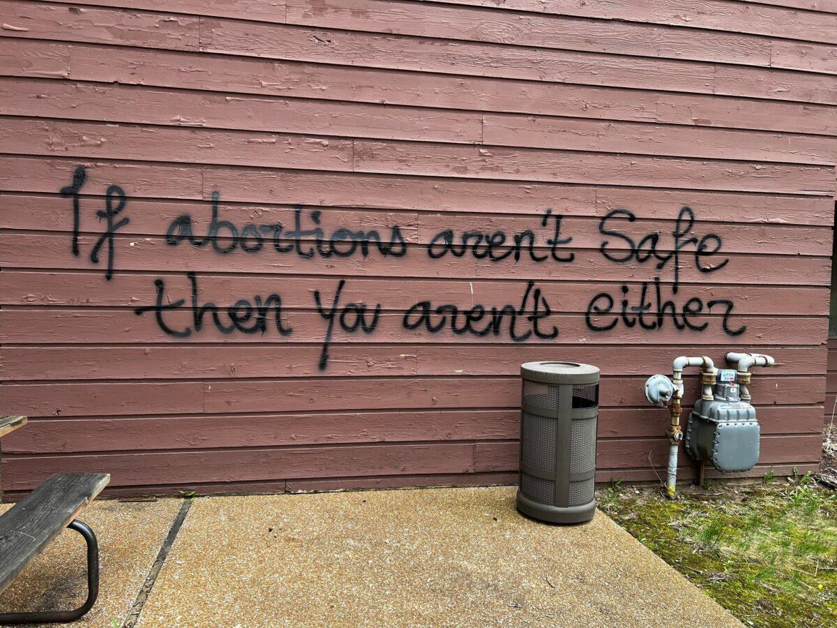 Graffiti on a wall outside the Wisconsin Family Action's offices in Madison, Wis., on. May 8, 2022. (Molly Beck/USA Today Network via Reuters)