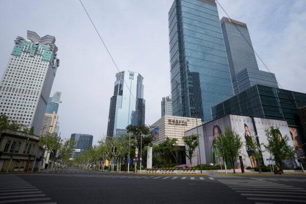 An empty road is seen in Shanghai's Central Business District (CBD) during a lockdown to prevent the spread of COVID-19 on April 16, 2022. (Aly Song/Reuters)