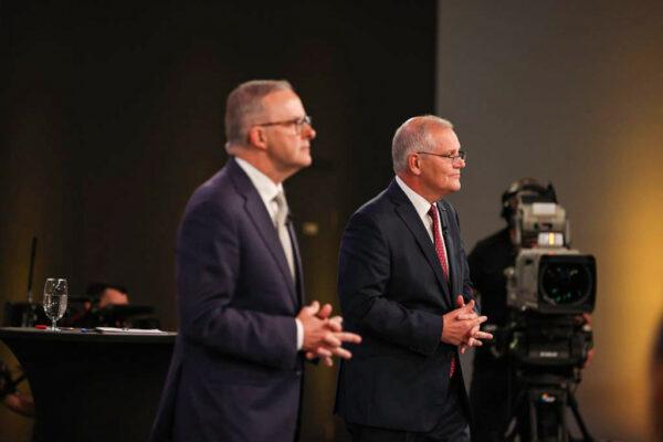 Leader of the Opposition Anthony Albanese (L) and Australian Prime Minister Scott Morrison attend the first leaders' debate of the 2022 federal election campaign in Brisbane, Australia, on April 20, 2022. (Jason Edwards - Pool/Getty Images)