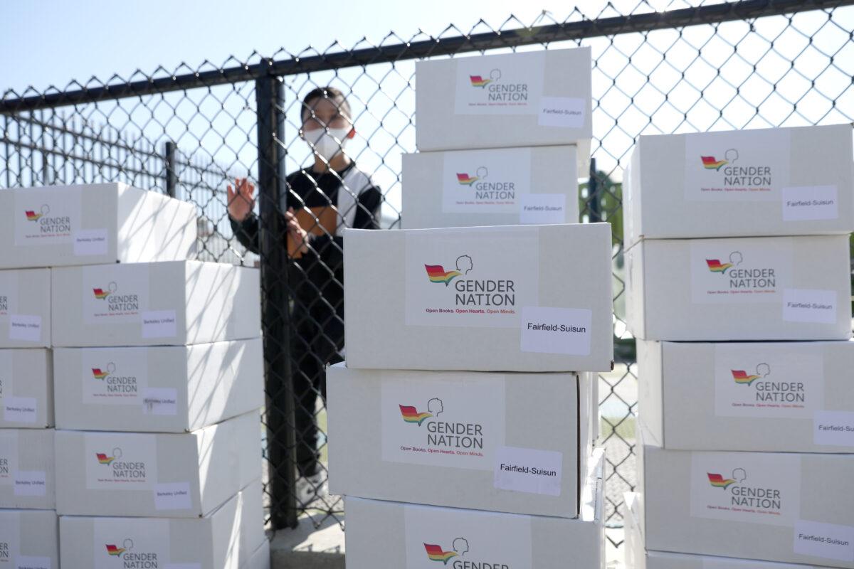 Boxes of donated LGBT books sit stacked on the playground at Nystrom Elementary School in Richmond, Calif., on May 17, 2022. (Justin Sullivan/Getty Images)