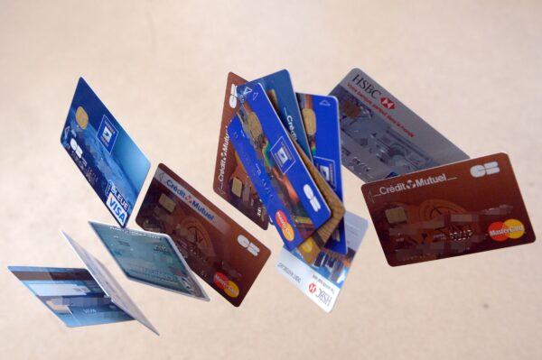 Credit cards falling down are pictured in Rennes, western France on Feb. 5, 2013. (DAMIEN MEYER/AFP via Getty Images)