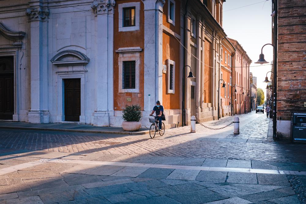 A bicyclist in the streets of Ravenna. (Jan Cattaneo/Shutterstock)