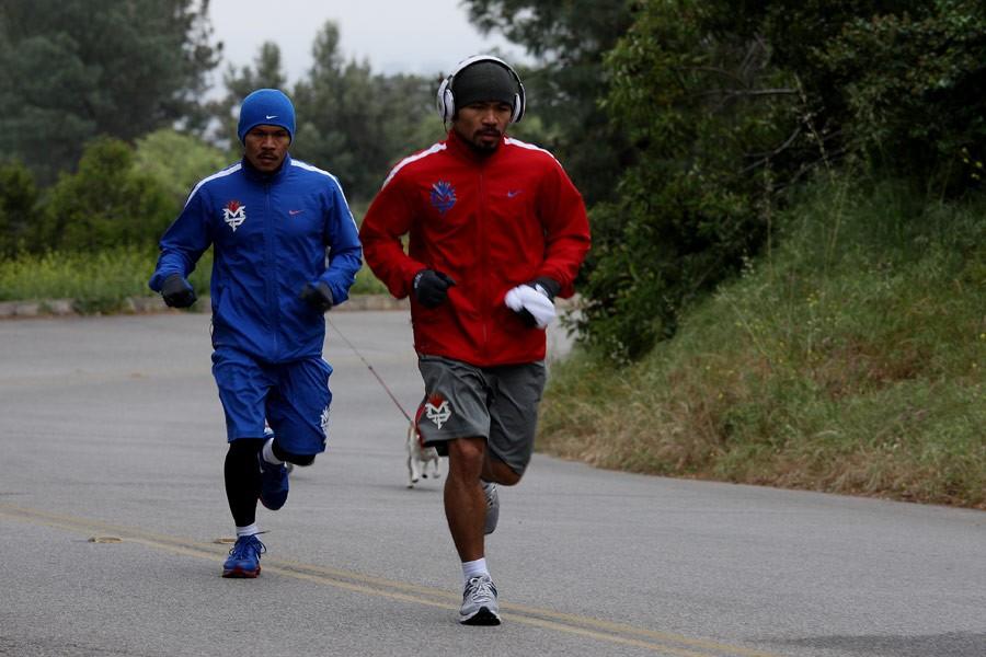 Manny Pacquiao (R) doing roadwork with a trainer in "Manny." (Gravitas Ventures/Universal Pictures)