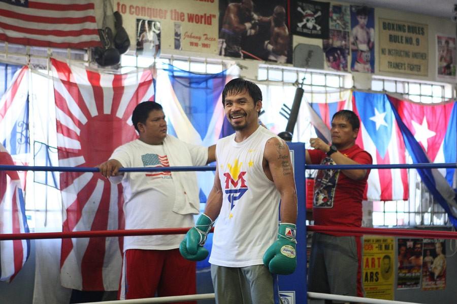 Manny Pacquiao (center) getting ready to spar in "Manny." (Gravitas Ventures/Universal Pictures)