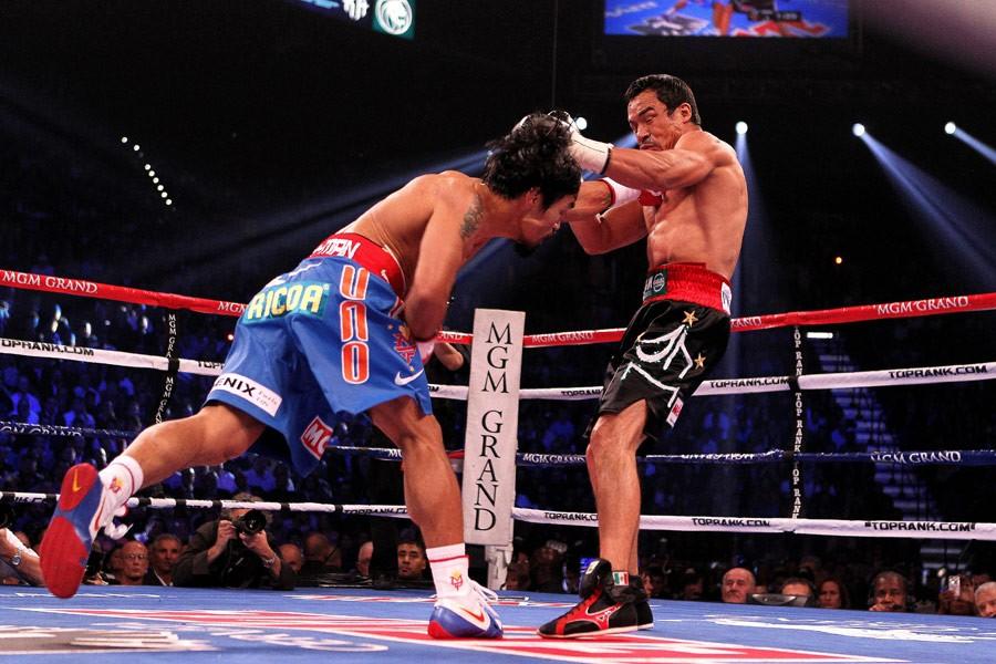 Manny Pacquiao (L) versus Juan Marquez in the documentary "Manny." (Gravitas Ventures/Universal Pictures)