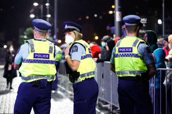 Police on patrol during Anzac Day dawn service at Pukeahu National War Memorial Park in Wellington, New Zealand, on April 25, 2022. (Hagen Hopkins/Getty Images)