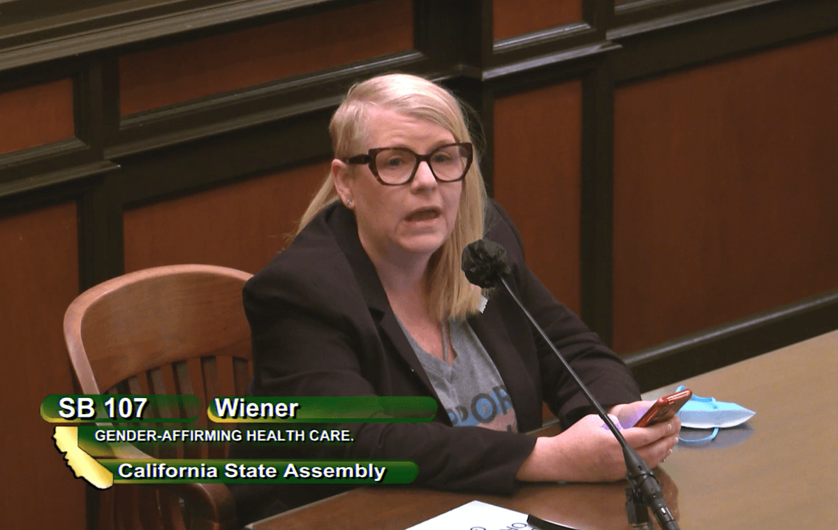 Kathie Moehlig, founder and executive director of Trans Family Support Services, speaks at a California Assembly judiciary committee hearing in Sacramento on June 8, 2022. (Screenshot via California State Assembly)