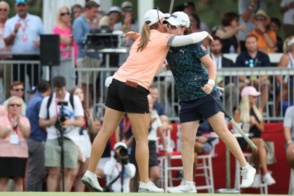Jennifer Kupcho of The United States hugs Leona Maguire after winning the tournament in a sudden death match during the final round of the Meijer LPGA Classic at Blythefield Country Club, in Grand Rapids, Mich., on June 19, 2022. (Rey Del Rio/Getty Images)