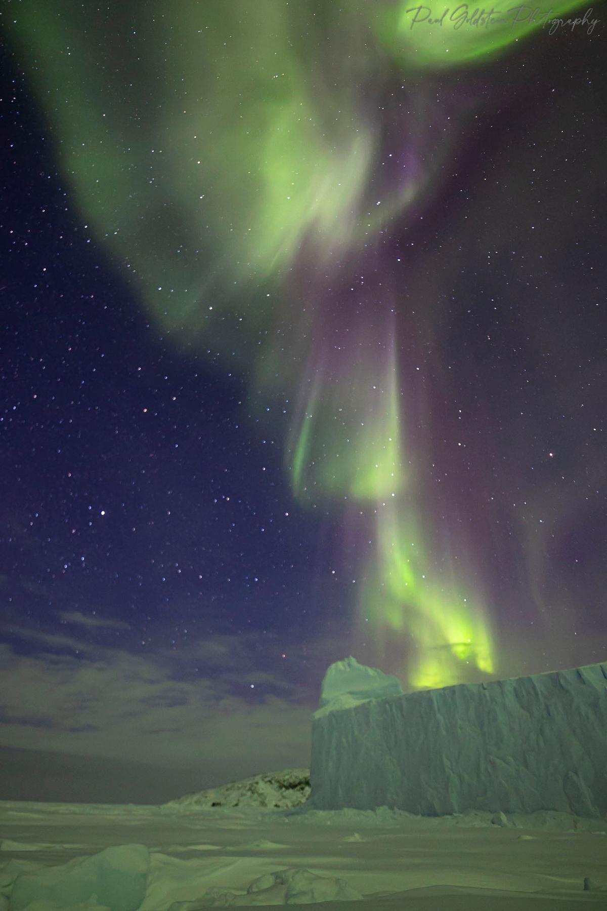 The snow glows green in Nunavut, Canada. (Courtesy ofPaul Goldstein)