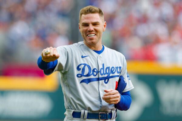 Freddie Freeman #5 of the Los Angeles Dodgers receives his World Series Ring from his 2021 season with the Atlanta Braves prior to the game between the Los Angeles Dodgers and Atlanta Braves at Truist Park, in Atlanta, on June 24, 2022. (Todd Kirkland/Getty Images)