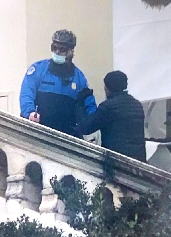 Darrel Kennemer speaks to an officer at the U.S. Capitol in Washington on Jan. 6, 2021. (Courtesy of Lora DeWolfe)