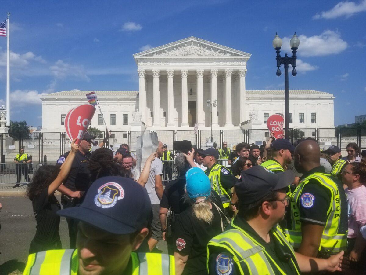 A confrontation between pro-life supporters and pro-abortion protesters in Washington on June 26, 2022. (Nathan Worcester/The Epoch Times)