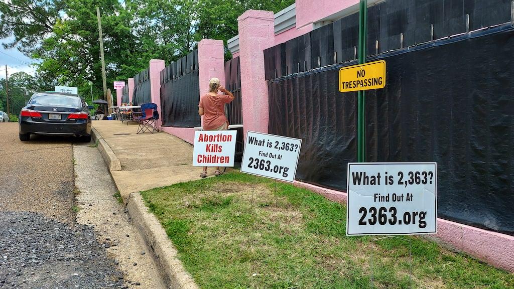 Anti-abortion protesters have demonstrated outside the Jackson Women's Health Organization, nicknamed the Pink House, in Mississippi for decades. (Matt McGregor/The Epoch Times)