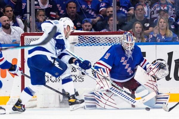 New York Rangers goaltender Igor Shesterkin (31) protects the net against Tampa Bay Lightning's Ondrej Palat (18) during the second period of Game 1 of the NHL hockey Stanley Cup playoffs Eastern Conference finals in New York, on June 1, 2022. (Frank Franklin II/AP Photo)