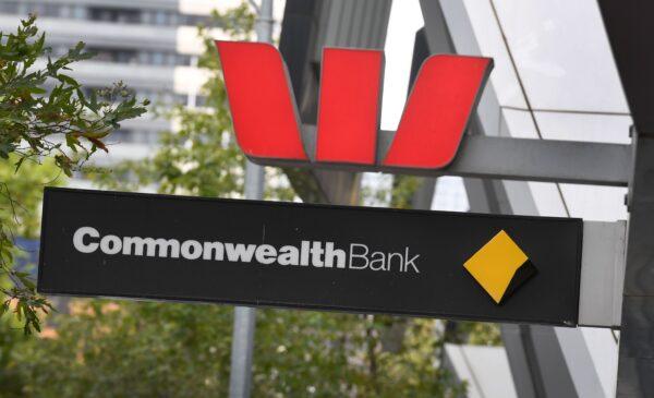 Signs adorn the branches of a Westpac and Commonwealth banks in Melbourne, Australia, on Feb. 4, 2019. (William West/AFP via Getty Images)