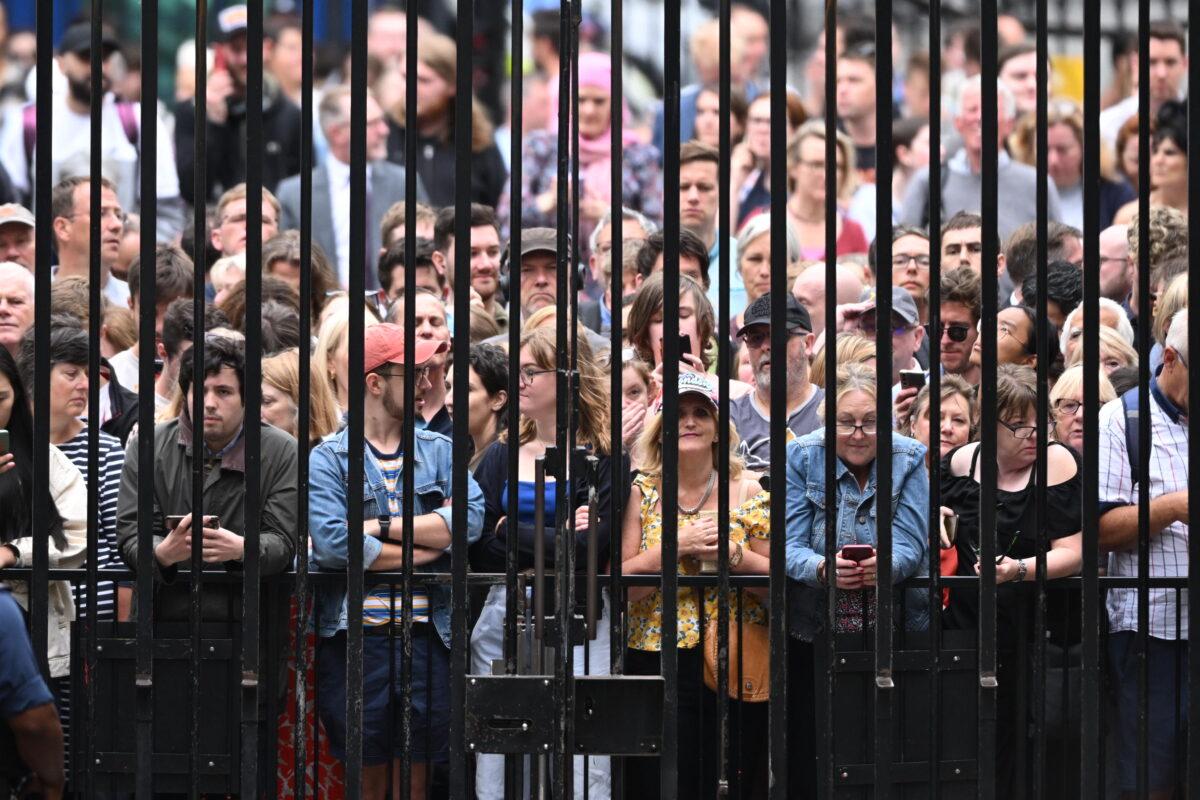 Crowds gather at the gates of Downing Street in preparation for a resignation speech from Prime Minister Boris Johnson in Downing Street in London on July 7, 2022. (Leon Neal/Getty Images)
