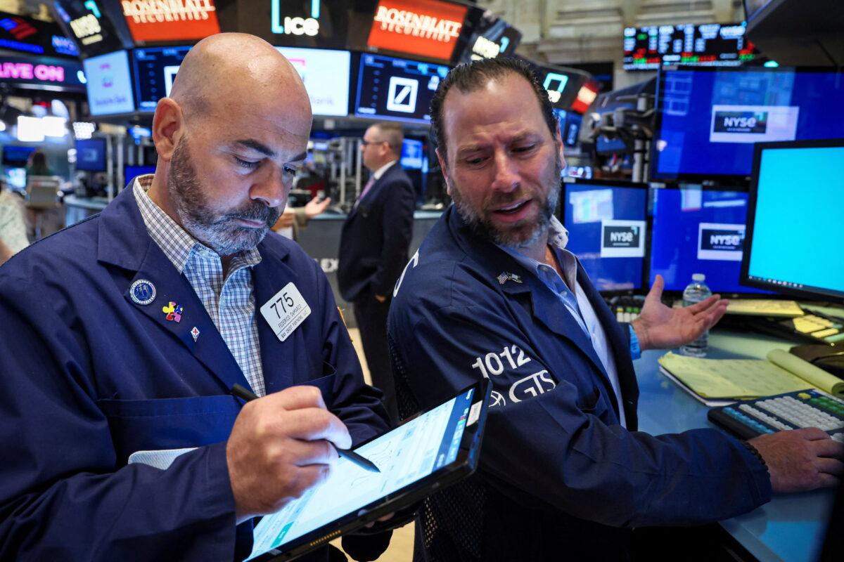 Traders work on the floor of the New York Stock Exchange in New York City, on June 30, 2022. (Brendan McDermid/Reuters)