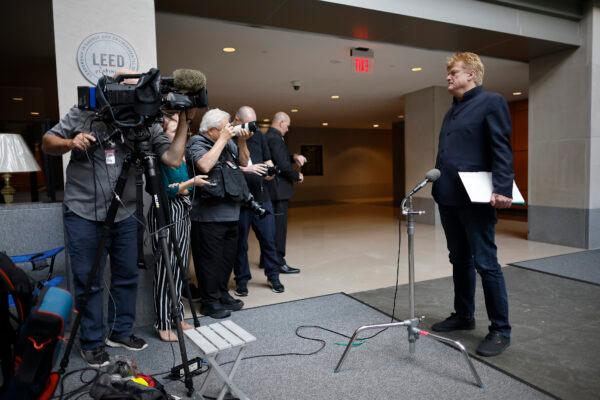 Former Overstock CEO Patrick Byrne stops to talk to reporters during a break in his interview with the House select committee investigating Jan. 6, 2021, in Washington on July 15, 2022. (Chip Somodevilla/Getty Images)