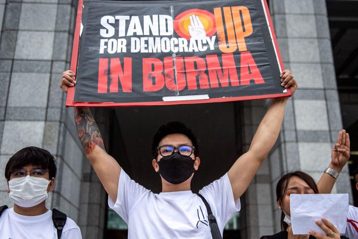 Activists, including Burmese nationals, participate in a rally to protest against Burma's junta execution of four prisoners, including a former lawmaker from Aung San Suu Kyi's party, outside the United Nations University in Tokyo on July 26, 2022. (Philip Fong/AFP via Getty Images)