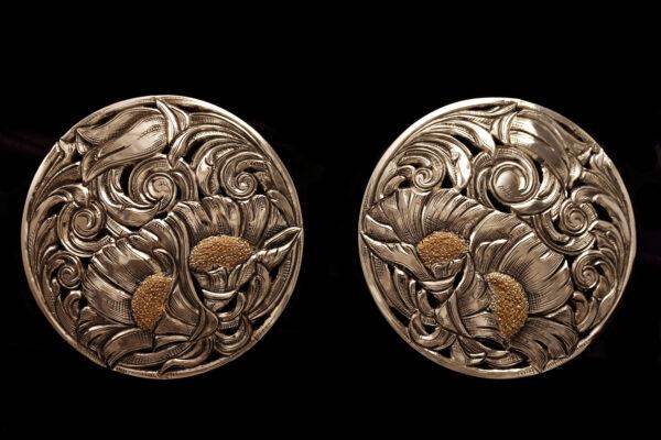 Pair of bridle conchos (round silver ornaments), 2020, by Scott Hardy. Sterling silver filigree (soldered sterling silver beadwork) with 14-karat gold flower centers. (Leslie Hardy)