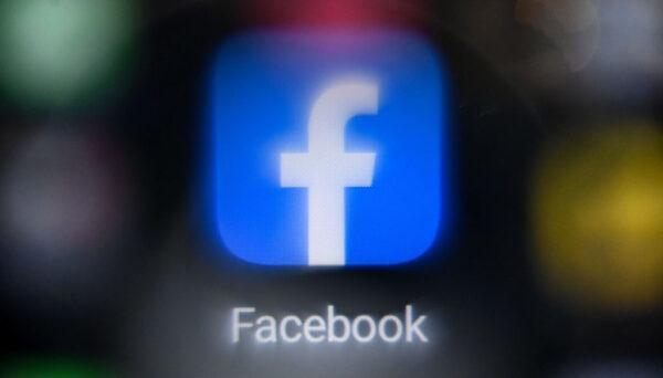Facebook's logo on a smartphone screen. (Kirill Kudryavtsev/AFP via Getty Images)