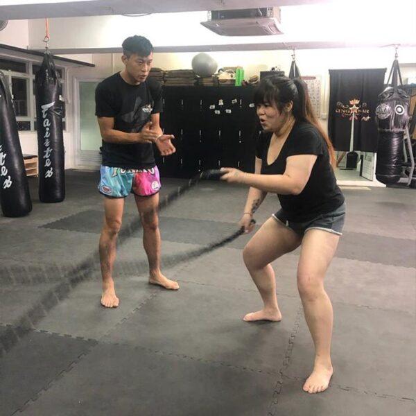 After successfully losing 60 pounds, she encountered a bottleneck. Cokimi, therefore, started to learn Muay Thai. She believed that Muay Thai is an excellent whole body exercise that can help her lose weight. (Courtesy of Cokimi)