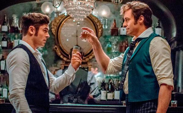 Zac Efron as Phillip Carlyle (L) and Hugh Jackman as P.T. Barnum in "The Greatest Showman." (20th Century Fox)