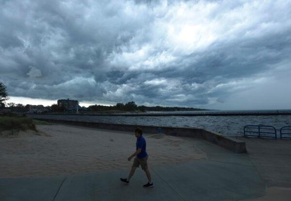 A front moves in over Lake Michigan at Tiscornia Park in St. Joseph, Mich., on Aug. 29, 2022. (Don Campbell/The Herald-Palladium via AP)