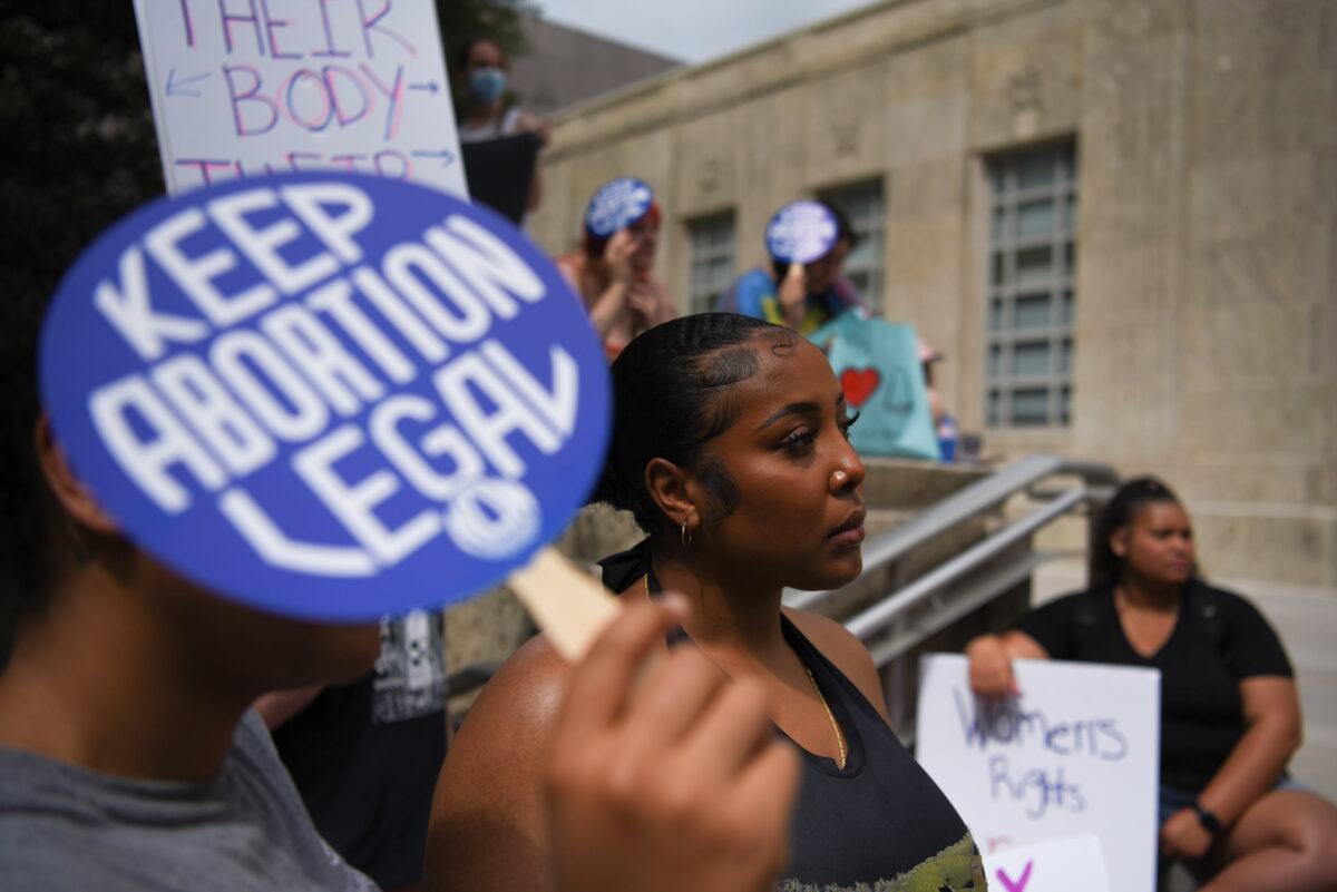 Abortion rights protesters participate in nationwide demonstrations following the leaked Supreme Court opinion suggesting the possibility of overturning the Roe v. Wade abortion rights decision, in Houston, Texas, May 14, 2022. (Callaghan O'Hare/Reuters)