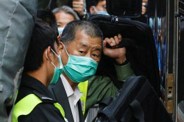 Media tycoon Jimmy Lai, founder of Apple Daily, looks on as he leaves the Court of Final Appeal by prison van, in Hong Kong, on Feb. 1, 2021. (Tyrone Siu/Reuters)