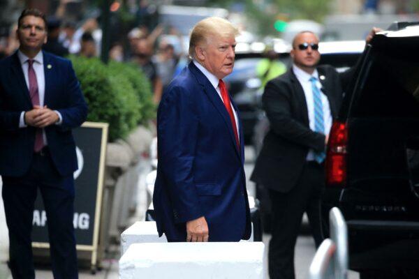 Former President Donald Trump walks to a vehicle outside of Trump Tower in New York on Aug. 10, 2022. (Stringer/AFP via Getty Images)