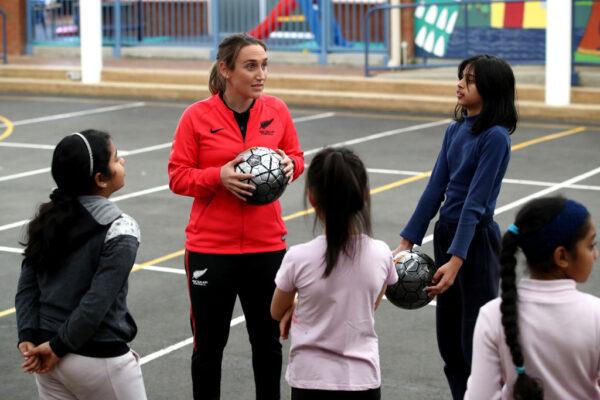 Football player Fern Annalie Longo participates in a skills coaching session with young children from the Mt Roskill Primary School during a New Zealand Football media opportunity at Mt Roskill Primary School in Auckland, New Zealand, on June 25, 2020. (Phil Walter/Getty Images)