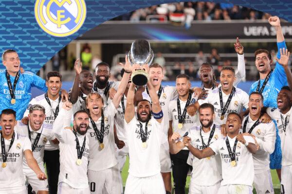 Players of Real Madrid celebrate as Karim Benzema, second goal-scorer, of Real Madrid lifts the UEFA Super Cup trophy after their sides victory during the UEFA Super Cup Final 2022 between Real Madrid CF and Eintracht Frankfurt at Helsinki Olympic Stadium in Helsinki, Finland, on August 10, 2022. (Alex Grimm/Getty Images)