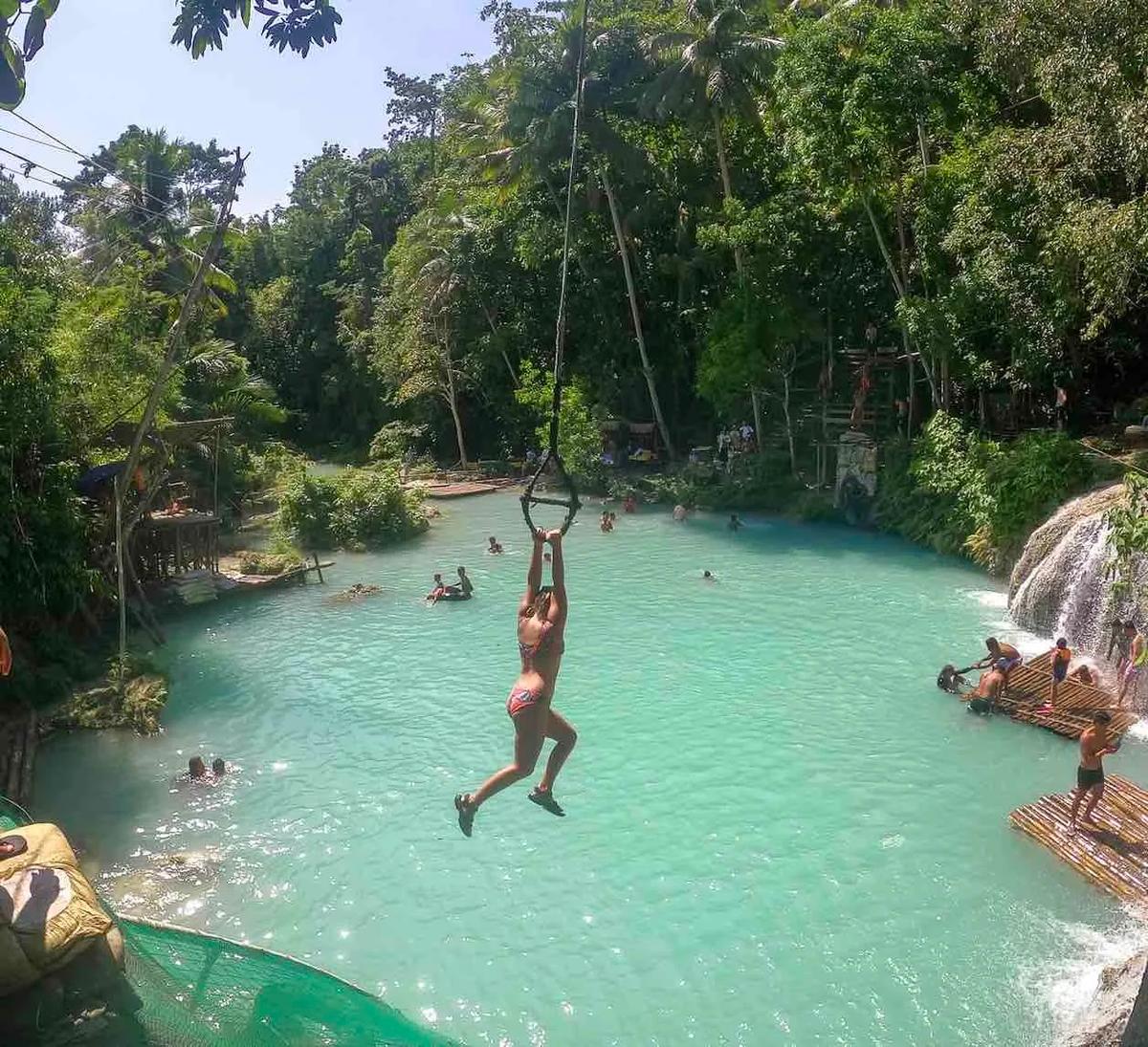 Rope swings at Cambugahay Falls. (Courtesy of Evie Farrell)
