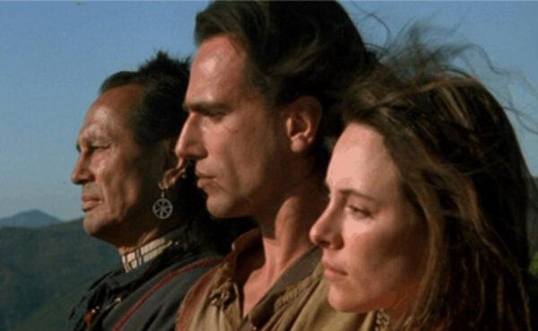 (L–R) Chingachgook (Russell Means), Hawkeye (Daniel Day-Lewis), and Cora (Madeleine Stowe) look out at the new land, in “The Last of the Mohicans.” (20th Century Fox)