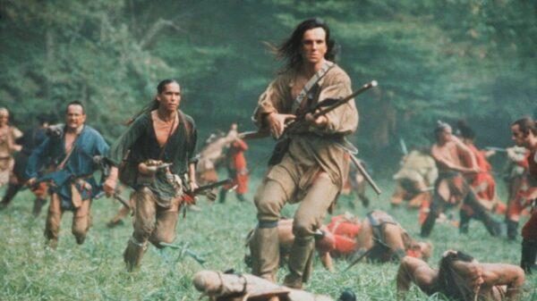 Hawkeye (Daniel Day-Lewis) leads an attack, in “The Last of the Mohicans.” (20th Century Fox)