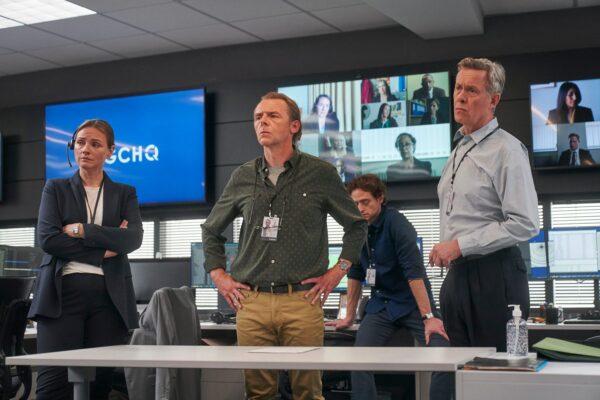 (L–R) Melanie Gutteridge, Simon Pegg, Andrew Rothney, and Alex Jennings in “The Undeclared War.” (Peacock)