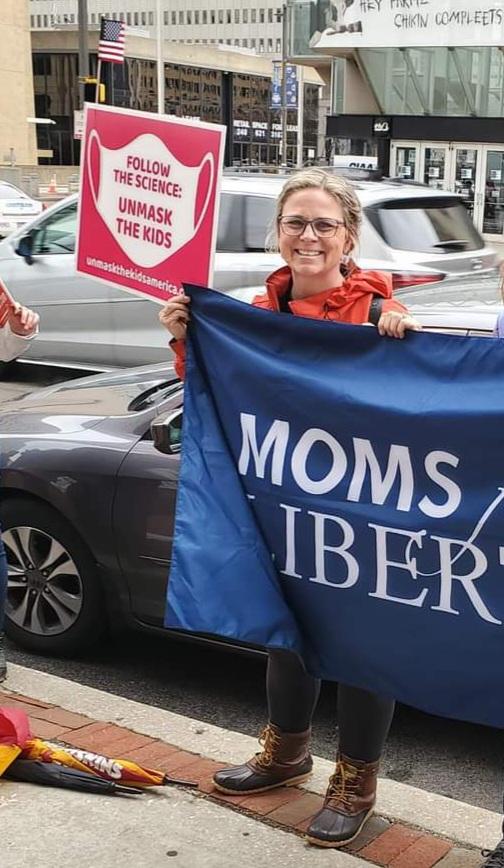 Registered nurse Jessica Garland demonstrates with the group Moms for Liberty. (Courtesy of Moms for Liberty)