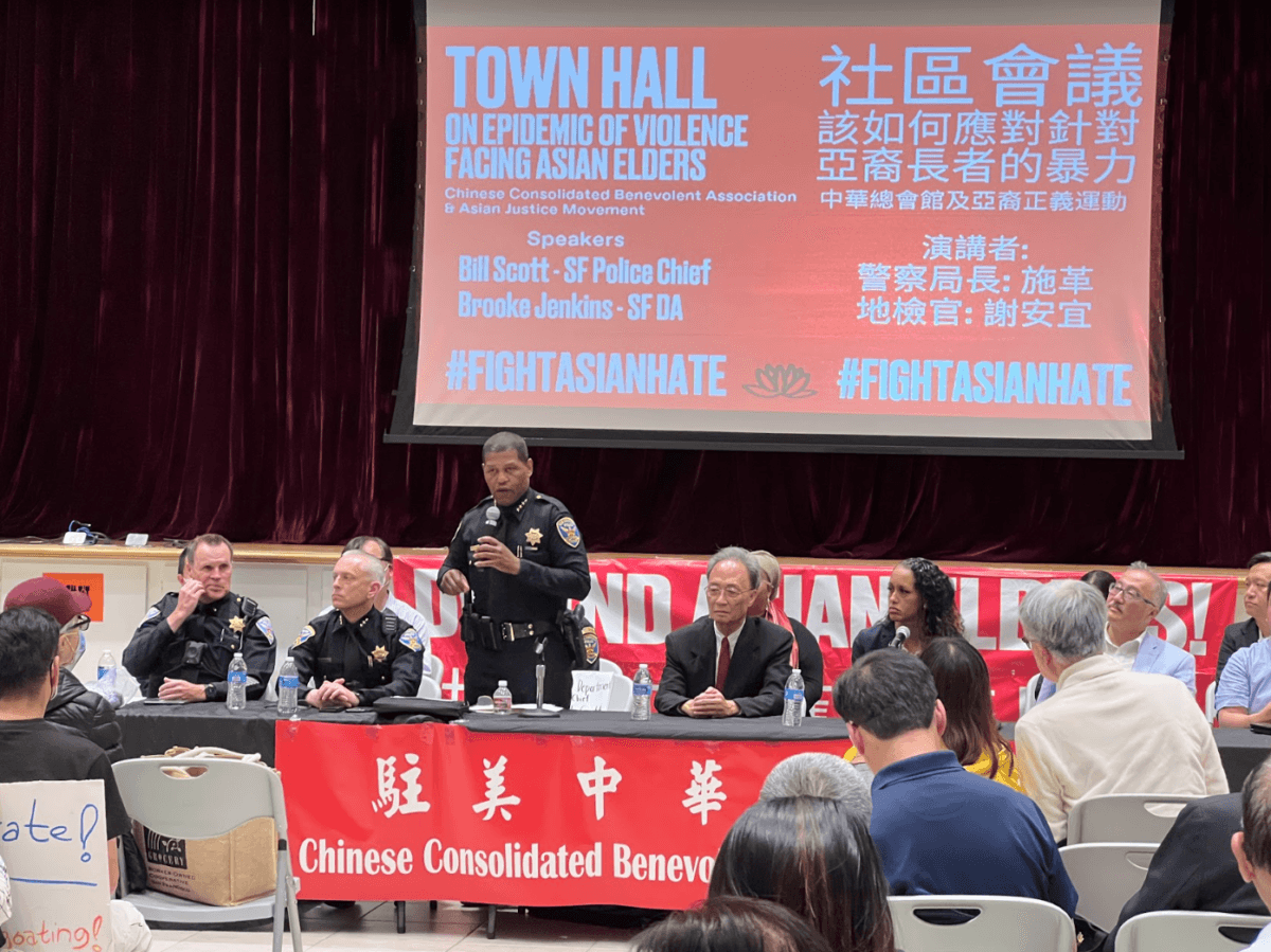 San Francisco Police Chief Bill Scott addresses an audience at a Town Hall at Victory Hall in San Francisco’s Chinatown on Aug. 16, 2022. (David Lam)