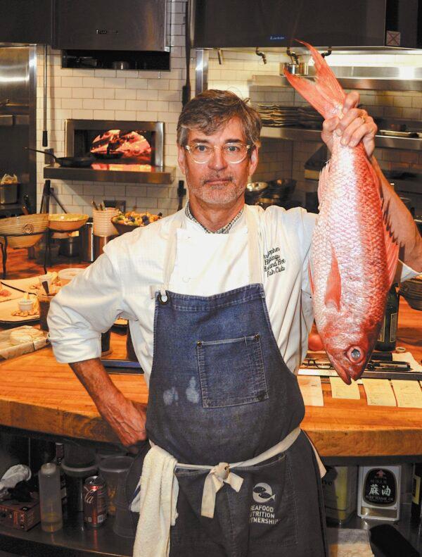 Chef Chris Hastings in the kitchen of the Hot & Hot Fish Club in Birmingham, Ala. (Karim Shamsi-Basha for American Essence)