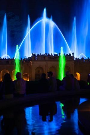 During the Festival of Fountains, Longwood creates a light and music show three nights per week that's controlled by a computer. The lights shine in reds, blues, yellows, greens, and whites. Folks with lawn chairs stake out their position early to watch the colorfully-illuminated fountains come alive and dance in sync with musical accompaniment. (Courtesy of J.H.Smith/Cartiophotos)