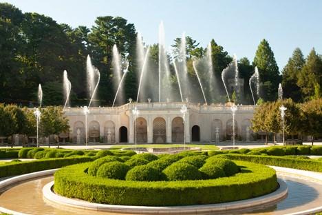 This epic fountain centerpiece of the Main Fountain Garden is animated with sculptured fountains rising up from the formal boxwood gardens. The raised stage is centered around the three arched loggias, an outdoor room that opens to the garden. (Courtesy of J.H.Smith/Cartiophotos)