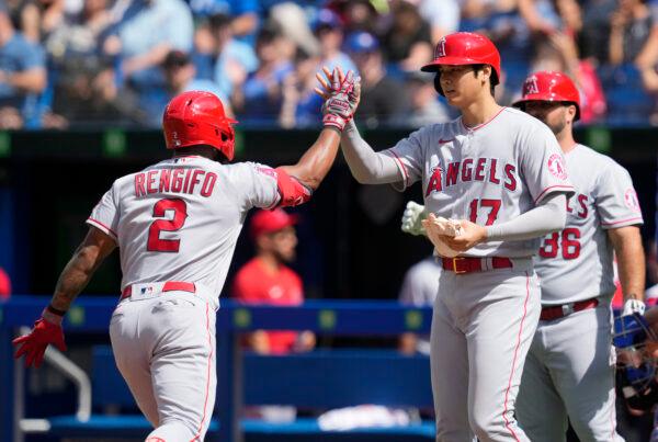 Luis Rengifo (2) of the Los Angeles Angels celebrates his home run with Shohei Ohtani (17) against the Toronto Blue Jays in the third inning during their MLB game at the Rogers Centre in Toronto, Ontario, Canada, August 28, 2022, (Mark Blinch/Getty Images)