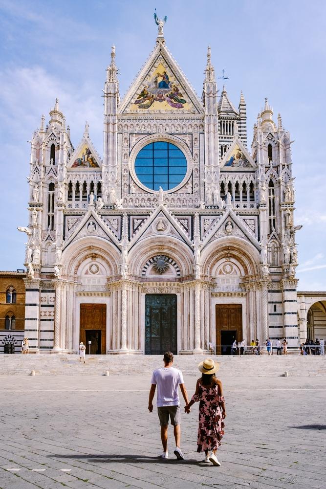 Begun in the Romanesque style, the Siena Cathedral became a prime example of Italian Gothic. (fokke baarssen/Shutterstock)