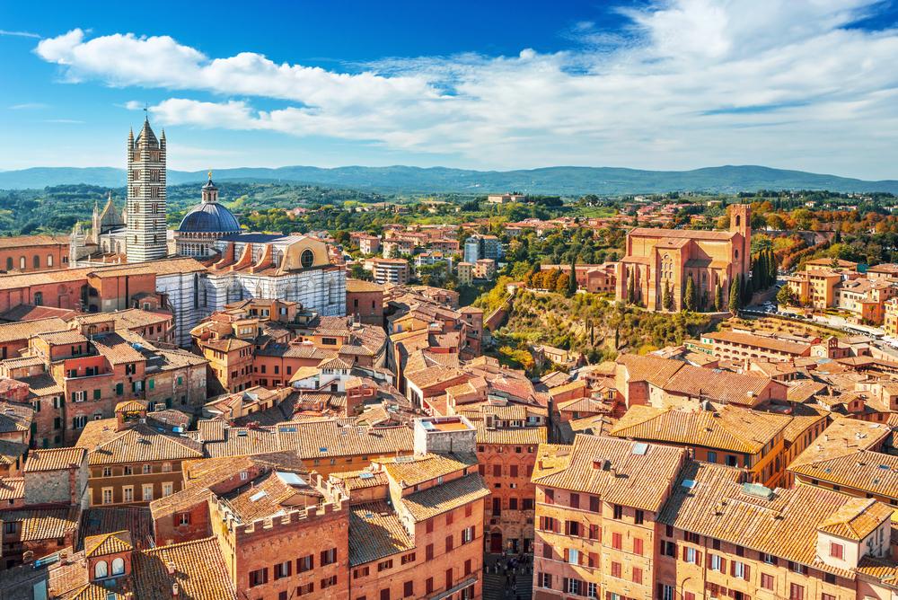 Siena's landmarks include its cathedral, Duomo di Siena, the Mangia Tower, and the Basilica of San Domenico. (Rasto SK/Shutterstock)