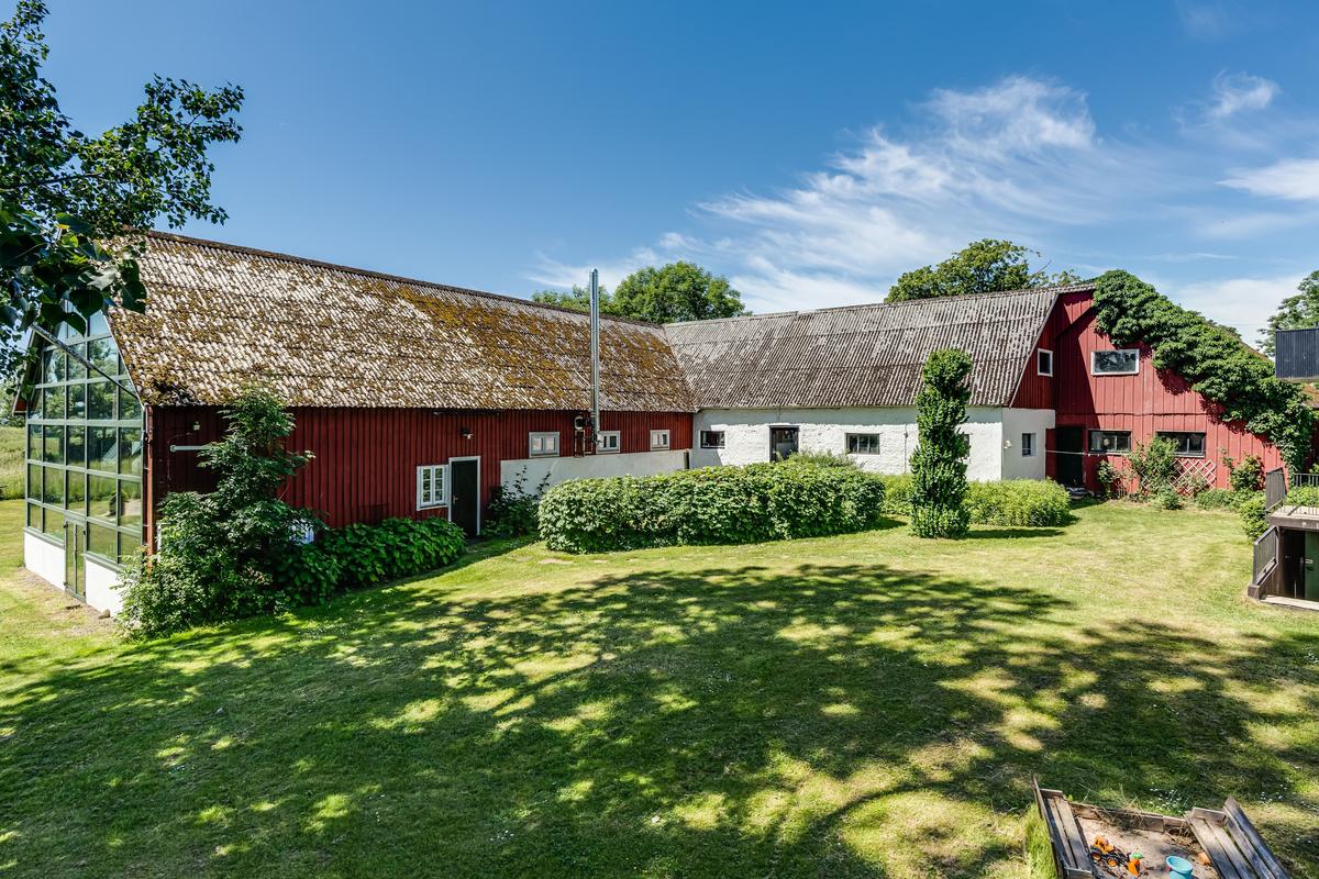 The main residence features a facade that is largely unchanged from its former farm glory. (Courtesy of Sweden Sotheby’s International Realty)