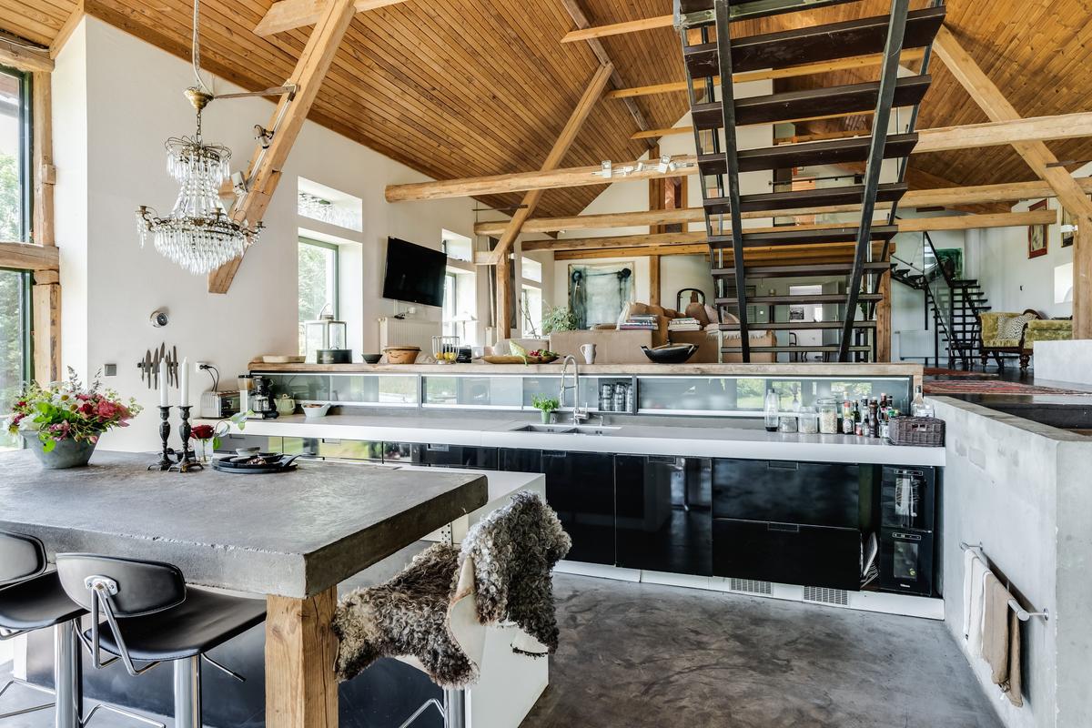 The designer’s focus was on providing functionality and livability when redoing the old barn, retaining rustic features whenever possible while adding modern amenities. (Courtesy of Sweden Sotheby’s International Realty)